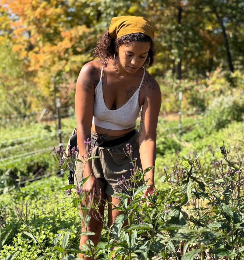 Brooke Marie Bridges working in a garden