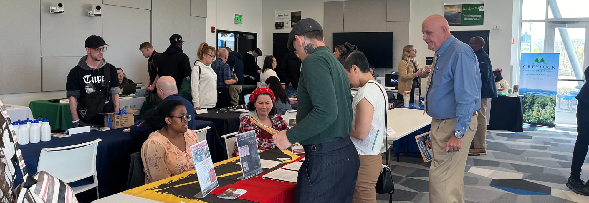 Community members at the job fair tables